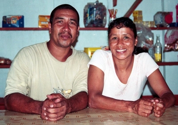 ...and off-duty with his wife in their village shop