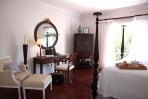 Cotton Bay Village: master bedroom of a suite